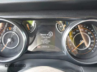 2022 Jeep Wrangler Unlimited Sport S with VIN 1C4HJXDG5NW105931, listed as a IAAI auction lot 42349628 with 37,314 mi miles and . Bid and sale history available at DreamBid. Image 7.