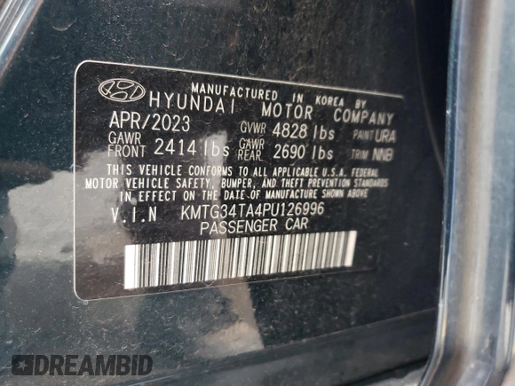 2023 Genesis G70 2.0T with VIN KMTG34TA4PU126996, listed as a Copart auction lot 69326704 with 24,882 mi miles and Non Repairable. Bid and sale history available at DreamBid. Image 13.