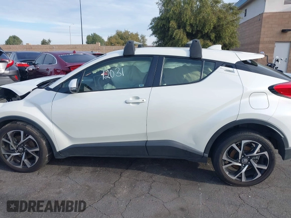 2019 Toyota C-HR XLE with VIN JTNKHMBX4K1040772, listed as a IAAI auction lot 41812031 with 79,729 mi miles. Bid and sale history available at carsss.com. Image 15.