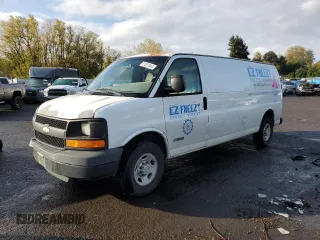2006 Chevrolet Express Cargo with VIN 1GCHG39U961111574, listed as a Copart auction lot 77357344 with 218,822 mi miles and Salvage title. Bid and sale history available at DreamBid. Image 1.