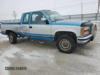 1992 GMC Sierra 2500 z VIN 2GTFK29K3N1539843, wystawiony jako Copart lot #45037335 z przebiegiem 146 355 mil mil oraz Szkody całkowita. Historia ofert i sprzedaży dostępna na DreamBid. Obrazek 4.