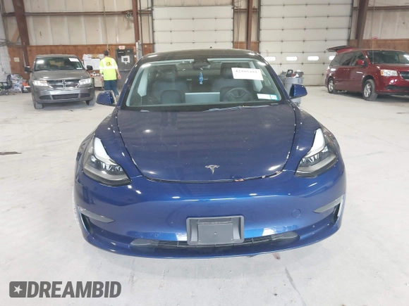 2022 Tesla Model 3 Long Range with VIN 5YJ3E1EB8NF255163, listed as a IAAI auction lot 42105451 with 40,166 mi miles and . Bid and sale history available at DreamBid. Image 12.