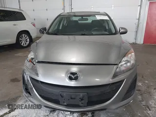 2011 Mazda Mazda3 i Touring with VIN JM1BL1VFXB1900999, listed as a IAAI auction lot 42067239 with 202,829 mi miles. Bid and sale history available at carsss.com. Image 12.