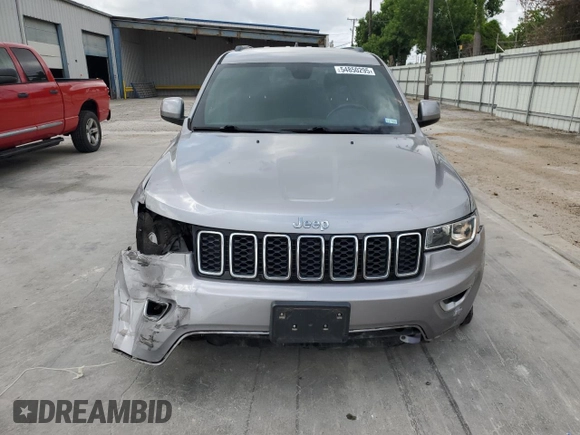 2017 Jeep Grand Cherokee Laredo with VIN 1C4RJEAG0HC664063, listed as a Copart auction lot 54850295 with 82,913 mi miles and Salvage title. Bid and sale history available at DreamBid. Image 5.
