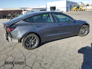 2023 Tesla Model 3 with VIN 5YJ3E1EA4PF556782, listed as a Copart auction lot 55626935 with 26,615 mi miles and Salvage title. Bid and sale history available at DreamBid. Image 3.