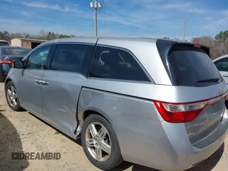 2012 Honda Odyssey Touring with VIN 5FNRL5H92CB108690, listed as a IAAI auction lot 41826580 with 150,327 mi miles and . Bid and sale history available at DreamBid. Image 14.