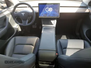 2023 Tesla Model Y Long Range z VIN 7SAYGDEE3PF772663, wystawiony jako Copart lot #56470455 z przebiegiem 50 705 mil mil oraz Czysty tytuł • Clean title. Historia ofert i sprzedaży dostępna na DreamBid. Obrazek 8.