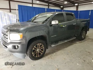2015 GMC Canyon 4WD SLT with VIN 1GTG6CE34F1149502, listed as a Copart auction lot 43412655 with 115,241 mi miles and Clean title. Bid and sale history available at DreamBid. Image 1.