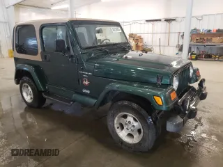 2000 Jeep Wrangler Sahara with VIN 1J4FA59S2YP778631, listed as a Copart auction lot 54313665 with 160,683 mi miles and Salvage Title. Bid and sale history available at carsss.com. Image 4.