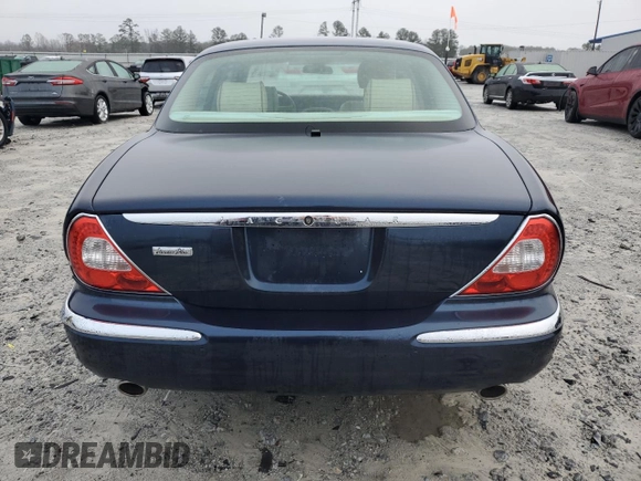 2007 Jaguar XJ Vanden Plas with VIN SAJWA82B57SH14424, listed as a Copart auction lot 45091395 with 99,242 mi miles and Salvage Title. Bid and sale history available at carsss.com. Image 6.