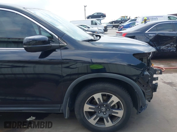 2017 Honda Ridgeline RTL z VIN 5FPYK2F55HB011463, wystawiony jako IAAI lot #42139030 z przebiegiem 59 066 mil mil oraz . Historia ofert i sprzedaży dostępna na DreamBid. Obrazek 18.