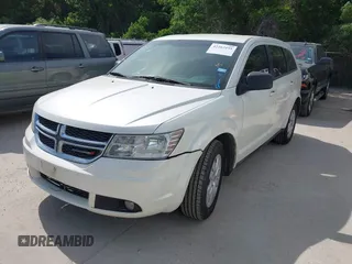 2013 Dodge Journey American Value with VIN 3C4PDCAB0DT723988, listed as a IAAI auction lot 42263191 with 205,014 mi miles and . Bid and sale history available at DreamBid. Image 2.