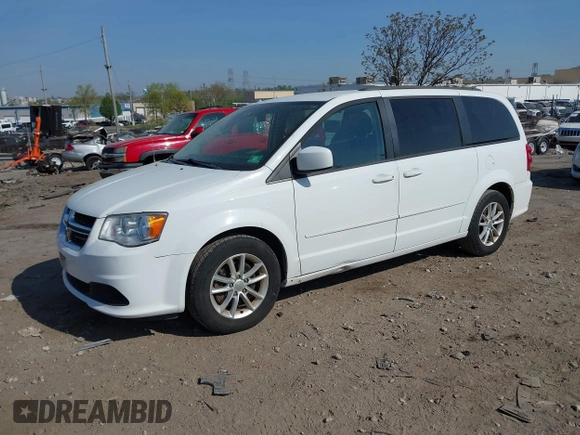 2016 Dodge Grand Caravan SXT with VIN 2C4RDGCG5GR275876, listed as a IAAI auction lot 42121344 with 140,652 mi miles. Bid and sale history available at carsss.com. Image 2.