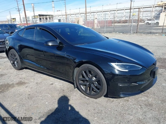 2022 Tesla Model S with VIN 5YJSA1E52NF488134, listed as a IAAI auction lot 41681556 with 1 mi miles. Bid and sale history available at carsss.com. Image 1.