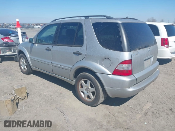 2003 Mercedes-Benz M-Class 3.2L with VIN 4JGAB54E23A383144, listed as a IAAI auction lot 41782124 with 148,084 mi miles. Bid and sale history available at carsss.com. Image 3.