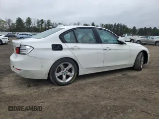 2013 BMW 3 Series 328i with VIN WBA3A5G58DNP21035, listed as a Copart auction lot 52529035 with 151,767 mi miles and Salvage Title. Bid and sale history available at carsss.com. Image 3.
