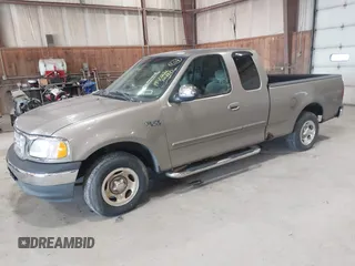 2001 Ford F-150 XL z VIN 1FTZX17241NB44865, wystawiony jako IAAI lot #42033863 z przebiegiem 145 072 mil mil oraz . Historia ofert i sprzedaży dostępna na DreamBid. Obrazek 2.