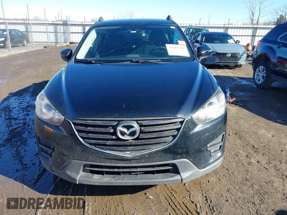 2016 Mazda CX-5 Sport with VIN JM3KE4BY0G0662294, listed as a IAAI auction lot 41469721 with 127,116 mi miles and . Bid and sale history available at carsss.com. Image 12.