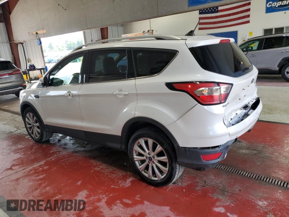 2018 Ford Escape Titanium с VIN 1FMCU9J90JUB30658, выставлен на аукционе Copart как лот 64001665 с пробегом 61 970 миль миль и Списание • Salvage title. История ставок и продаж доступна на DreamBid. Изображение 2.