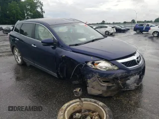 2011 Mazda CX-9 Grand Touring with VIN JM3TB2DA0B0320628, listed as a Copart auction lot 56310725 with 119,068 mi miles and Salvage title. Bid and sale history available at DreamBid. Image 4.