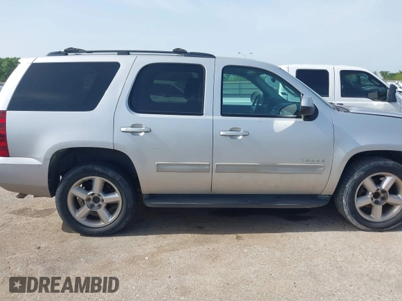 2011 Chevrolet Tahoe LS with VIN 1GNSCAE0XBR111949, listed as a IAAI auction lot 42630787 with 220,857 mi miles and . Bid and sale history available at DreamBid. Image 13.
