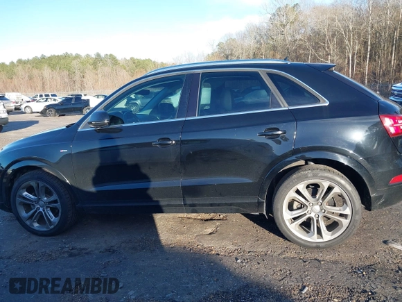 2017 Audi Q3 Premium Plus z VIN WA1JCCFS3HR002400, wystawiony jako IAAI lot #41464520 z przebiegiem 100 560 mil mil oraz . Historia ofert i sprzedaży dostępna na DreamBid. Obrazek 14.