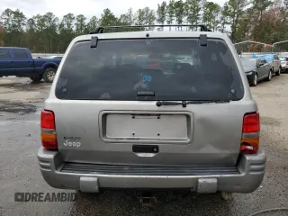 1997 Jeep Grand Cherokee Limited with VIN 1J4GZ78Y0VC682949, listed as a Copart auction lot 82152424 with 194,576 mi miles and Salvage Title. Bid and sale history available at carsss.com. Image 6.