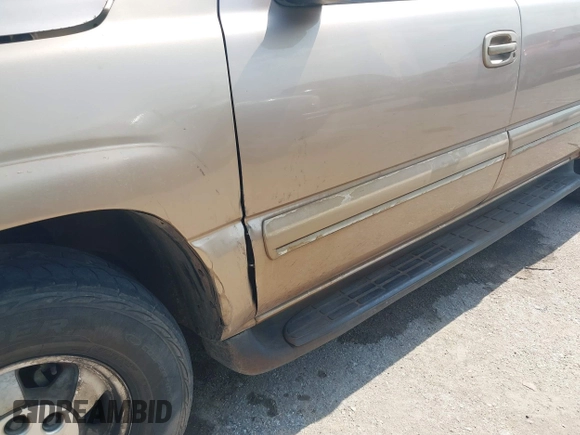 2001 Chevrolet Suburban LS z VIN 3GNEC16T21G214738, wystawiony jako IAAI lot #42433747 z przebiegiem Nie podano mil oraz . Historia ofert i sprzedaży dostępna na DreamBid. Obrazek 6.