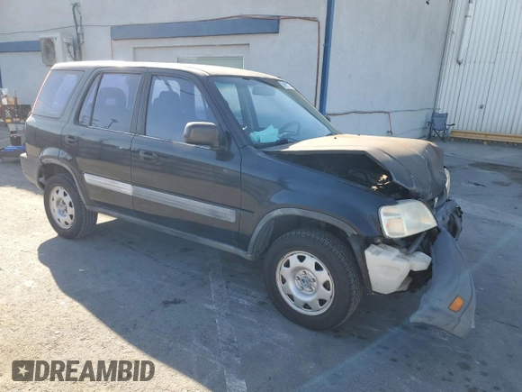 2000 Honda CR-V LX with VIN JHLRD2848YC006656, listed as a Copart auction lot 84562074 with 230,352 mi miles and Salvage Title. Bid and sale history available at carsss.com. Image 4.