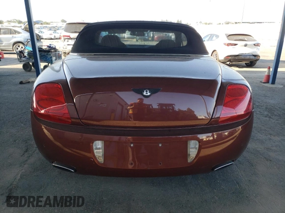 2007 Bentley Continental GT with VIN SCBDR33W77C047935, listed as a Copart auction lot 60557985 with 61,661 mi miles and Salvage title. Bid and sale history available at DreamBid. Image 6.