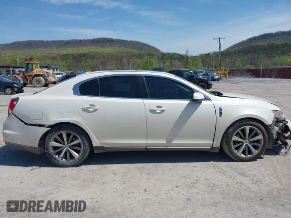 2009 Lincoln MKS with VIN 1LNHM94R09G602997, listed as a IAAI auction lot 42095272 with 122,682 mi miles and . Bid and sale history available at DreamBid. Image 14.