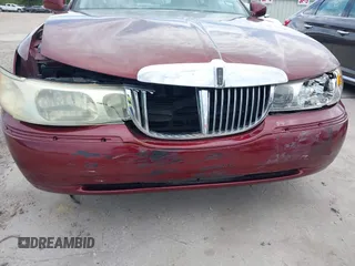 2002 Lincoln Town Car Cartier z VIN 1LNHM83W52Y626407, wystawiony jako IAAI lot #37616886 z przebiegiem 100 272 mil mil oraz . Historia ofert i sprzedaży dostępna na DreamBid. Obrazek 6.