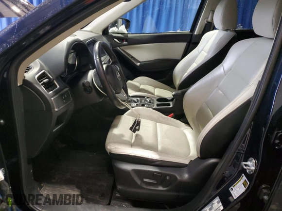 2016 Mazda CX-5 Grand Touring with VIN JM3KE4DY9G0708024, listed as a Copart auction lot 44689995 with 113,002 mi miles and Salvage Title. Bid and sale history available at DreamBid. Image 7.