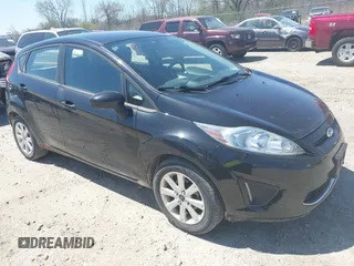 2012 Ford Fiesta SE z VIN 3FADP4EJ5CM157309, wystawiony jako IAAI lot #42184486 z przebiegiem 103 849 mil mil oraz . Historia ofert i sprzedaży dostępna na DreamBid. Obrazek 1.