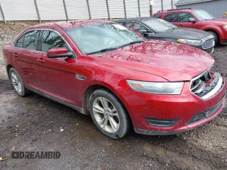 2014 Ford Taurus SEL with VIN 1FAHP2E88EG150130, listed as a IAAI auction lot 41955023 with 133,813 mi miles. Bid and sale history available at carsss.com. Image 1.