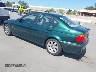 1999 BMW 3 Series 323i with VIN WBAAM3336XFP55691, listed as a IAAI auction lot 42033522 with 129,067 mi miles. Bid and sale history available at carsss.com. Image 3.