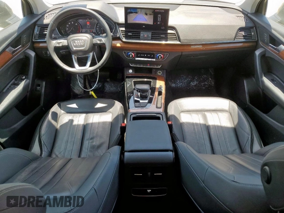 2021 Audi Q5 Premium with VIN WA1AAAFY2M2004785, listed as a Copart auction lot 56500595 with 79,376 mi miles and Salvage title. Bid and sale history available at DreamBid. Image 8.