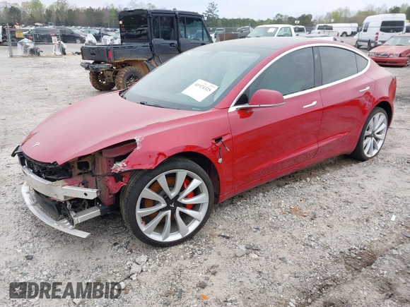 2018 Tesla Model 3 Long Range Battery with VIN 5YJ3E1EB7JF055384, listed as a IAAI auction lot 41924325 with 52,039 mi miles and . Bid and sale history available at DreamBid. Image 16.