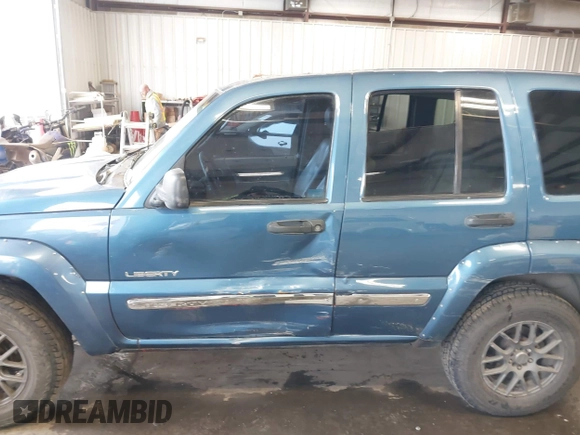 2004 Jeep Liberty Limited with VIN 1J4GK58K84W226666, listed as a IAAI auction lot 41764238 with 148,664 mi miles. Bid and sale history available at carsss.com. Image 14.