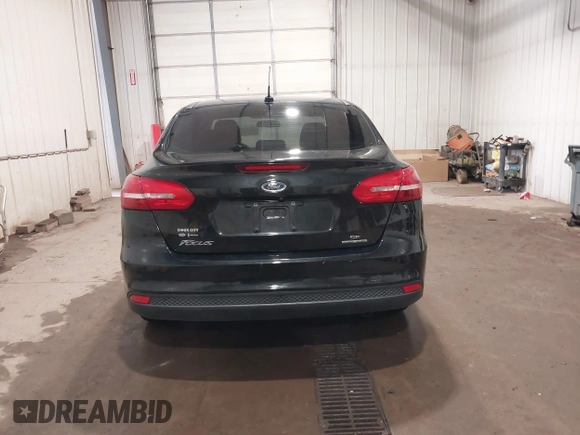 2015 Ford Focus SE with VIN 1FADP3F29FL203084, listed as a IAAI auction lot 42357973 with 99,002 mi miles and . Bid and sale history available at DreamBid. Image 16.