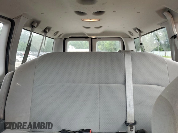 2010 Ford Econoline Passenger XL с VIN 1FMNE1BL6ADA18772, выставлен на аукционе Copart как лот 59190985 с пробегом 154 331 миль миль и Чистый • Clean title. История ставок и продаж доступна на DreamBid. Изображение 10.