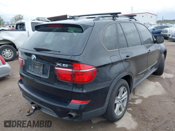 2012 BMW X5 35d z VIN 5UXZW0C55CL674191, wystawiony jako IAAI lot #41906713 z przebiegiem 143 687 mil mil oraz . Historia ofert i sprzedaży dostępna na DreamBid. Obrazek 4.