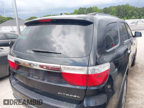 2011 Dodge Durango Citadel with VIN 1D4RD5GG6BC637877, listed as a IAAI auction lot 42434083 with 254,579 mi miles and . Bid and sale history available at DreamBid. Image 4.