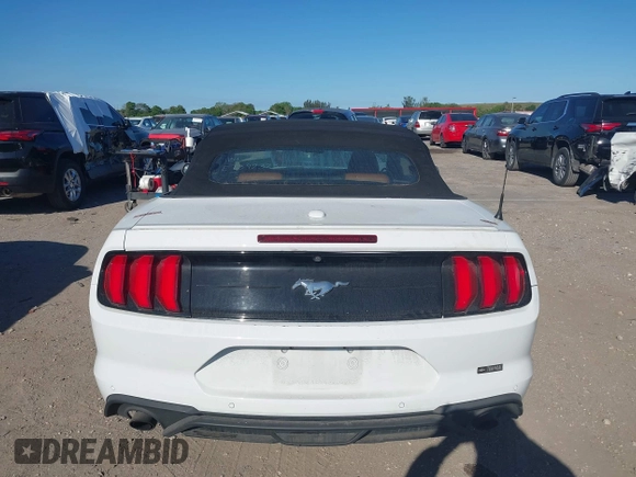 2019 Ford Mustang EcoBoost z VIN 1FATP8UH8K5162526, wystawiony jako IAAI lot #41846704 z przebiegiem 84 527 mil mil oraz . Historia ofert i sprzedaży dostępna na DreamBid. Obrazek 17.