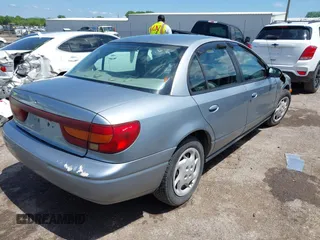2002 Saturn SL z VIN 1G8ZK52732Z152274, wystawiony jako IAAI lot #42103737 z przebiegiem 56 781 mil mil oraz . Historia ofert i sprzedaży dostępna na DreamBid. Obrazek 4.