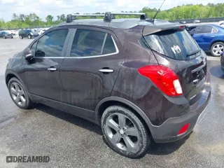 2014 Buick Encore Leather with VIN KL4CJCSB0EB593259, listed as a IAAI auction lot 41994204 with 215,292 mi miles. Bid and sale history available at carsss.com. Image 3.