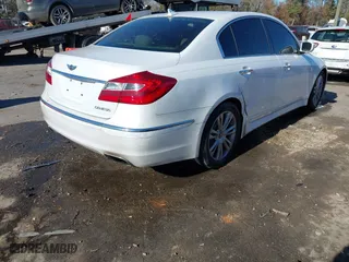 2014 Hyundai Genesis 3.8L with VIN KMHGC4DD7EU259381, listed as a IAAI auction lot 40799986 with 116,850 mi miles. Bid and sale history available at carsss.com. Image 4.
