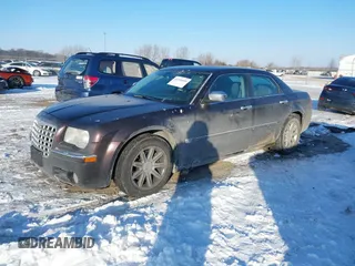 2005 Chrysler 300 with VIN 2C3AA63H65H526016, listed as a IAAI auction lot 41296420 with 136,794 mi miles. Bid and sale history available at carsss.com. Image 17.