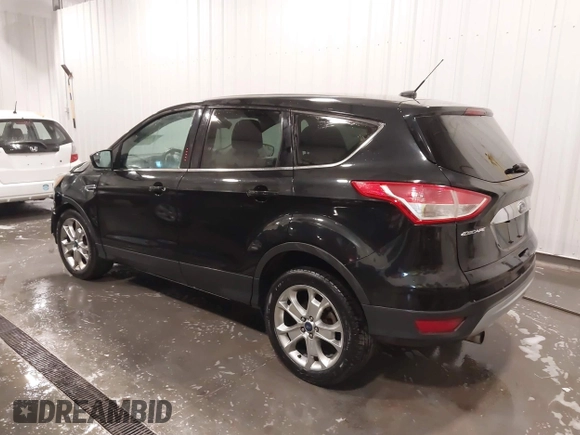 2013 Ford Escape SEL with VIN 1FMCU9H99DUD11347, listed as a IAAI auction lot 41758824 with 154,339 mi miles. Bid and sale history available at carsss.com. Image 3.