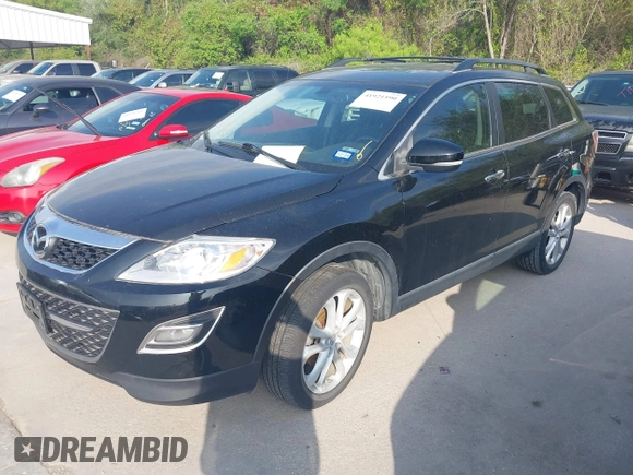 2012 Mazda CX-9 Grand Touring with VIN JM3TB2DA4C0343878, listed as a IAAI auction lot 41921590 with 168,927 mi miles and . Bid and sale history available at DreamBid. Image 2.